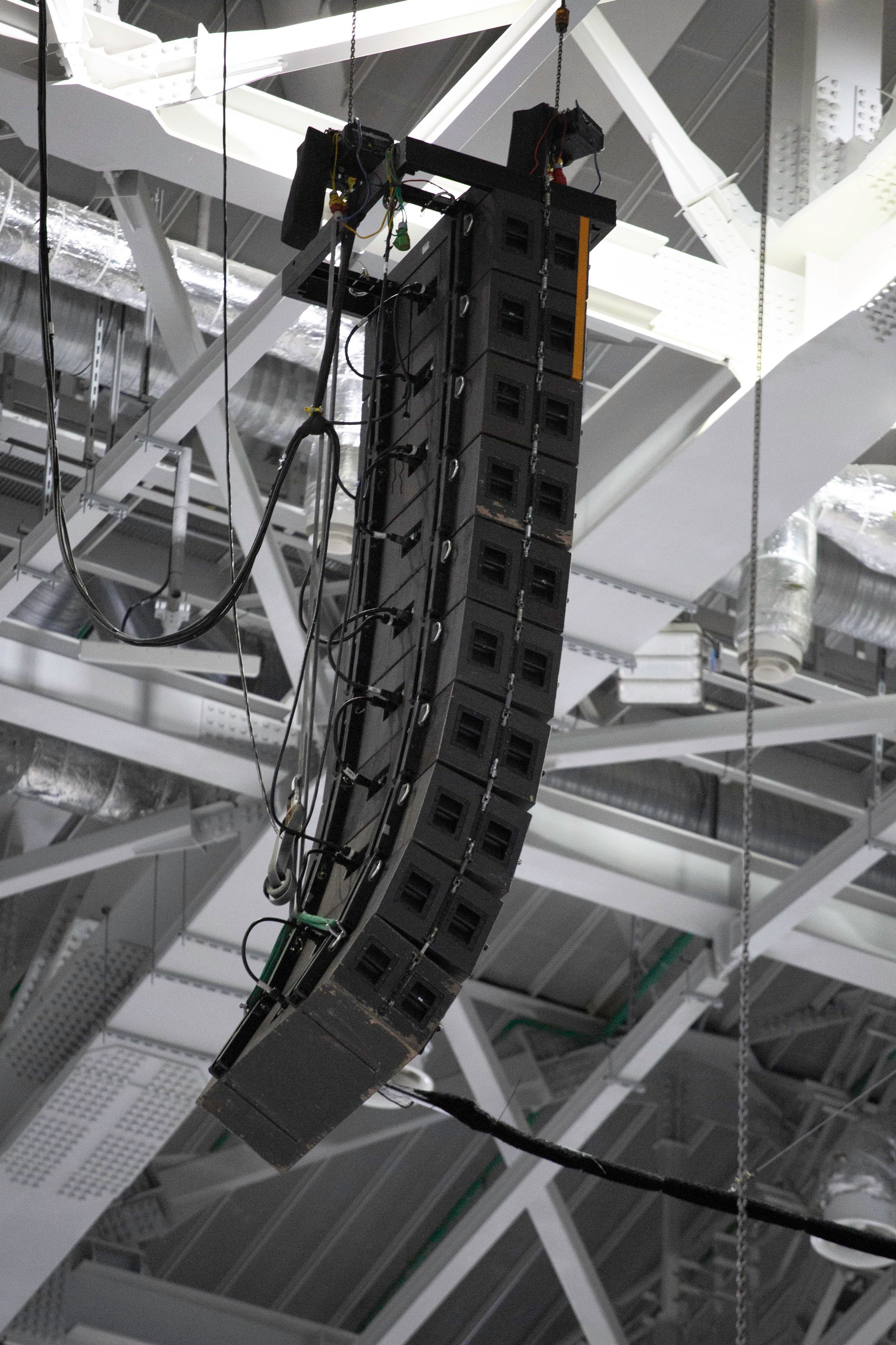 Line array sound speakers for concert. Side view. Professional sound equipment.
